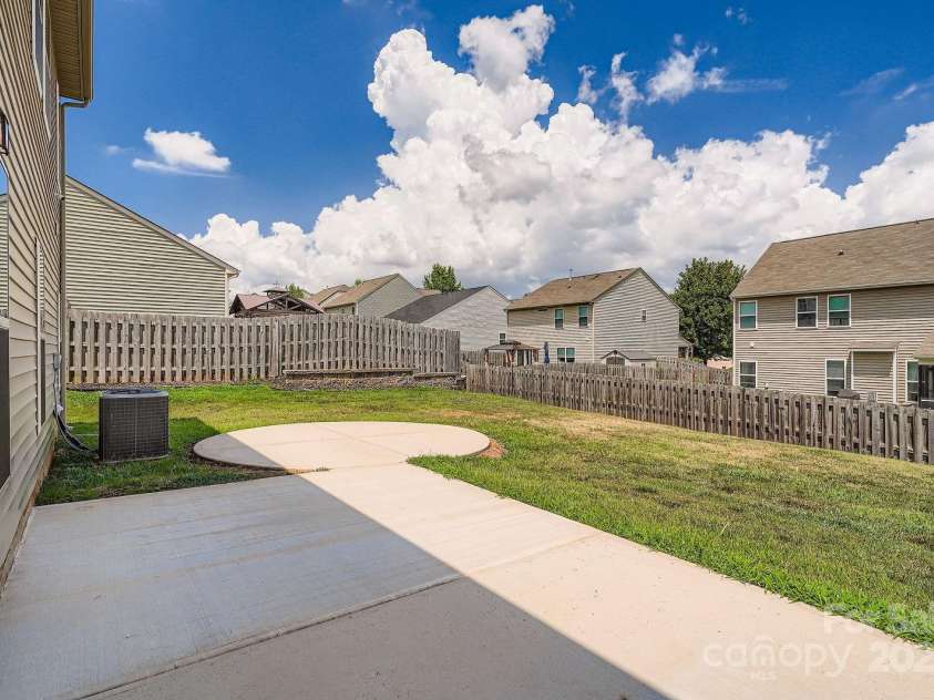 171 Gage Drive, Mooresville, NC 28115.  MLS# CAR4287060, YatesRealty ID 31264. Back Patio