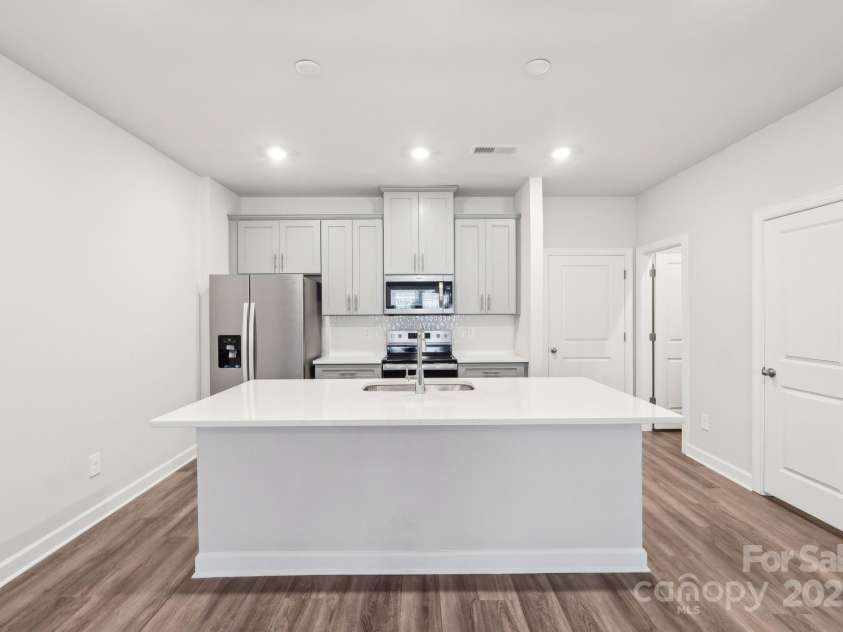 115 Ciara Place, Mooresville, NC 28117.  MLS# CAR4198397, YatesRealty ID 31265. Photo is not of the actual home, but is an inspirational photo of builder’s model home and may depict options, furnishings, and/or decorator features that are not included