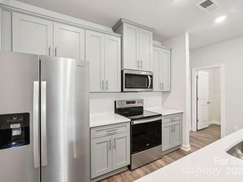 115 Ciara Place, Mooresville, NC 28117.  MLS# CAR4198397, YatesRealty ID 31265. Photo is not of the actual home, but is an inspirational photo of builder’s model home and may depict options, furnishings, and/or decorator features that are not included