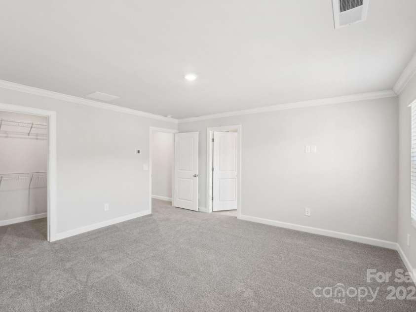115 Ciara Place, Mooresville, NC 28117.  MLS# CAR4198397, YatesRealty ID 31265. Photo is not of the actual home, but is an inspirational photo of builder’s model home and may depict options, furnishings, and/or decorator features that are not included