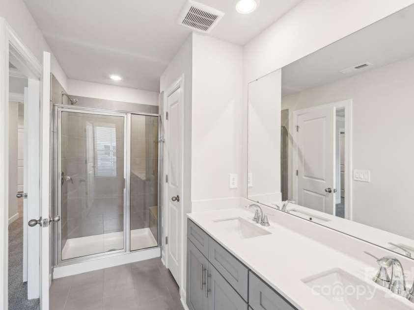115 Ciara Place, Mooresville, NC 28117.  MLS# CAR4198397, YatesRealty ID 31265. Photo is not of the actual home, but is an inspirational photo of builder’s model home and may depict options, furnishings, and/or decorator features that are not included