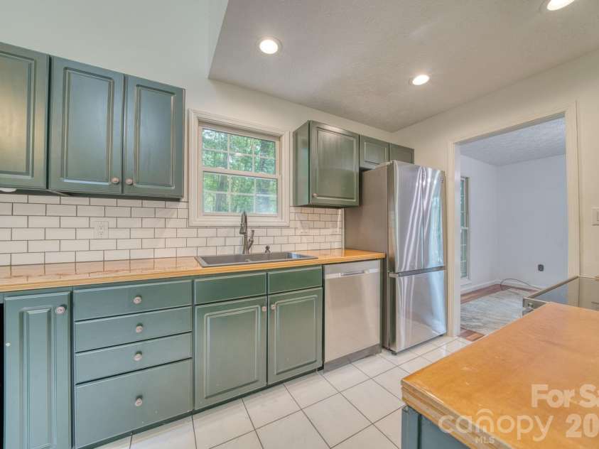 163 Canaan Drive, Candler, NC 28715.  MLS# CAR4426253, YatesRealty ID 31269. 
