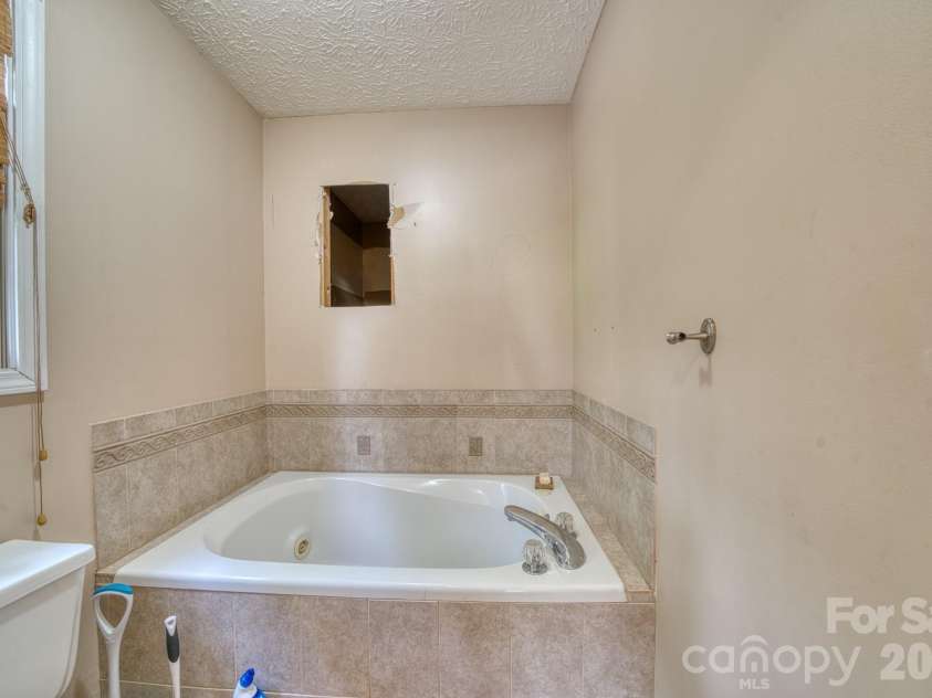 163 Canaan Drive, Candler, NC 28715.  MLS# CAR4426253, YatesRealty ID 31269. 