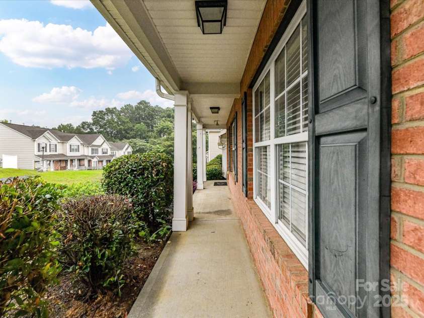 3516 Calpella Court, Charlotte, NC 28262.  MLS# CAR4290100, YatesRealty ID 31269. Covered Front Porch