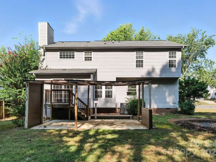 9003 Steelechase Drive, Charlotte, NC 28273.  MLS# CAR4288220, YatesRealty ID 31275. Back of House