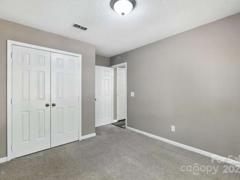 9003 Steelechase Drive, Charlotte, NC 28273.  MLS# CAR4288220, YatesRealty ID 31275. Bedroom 4