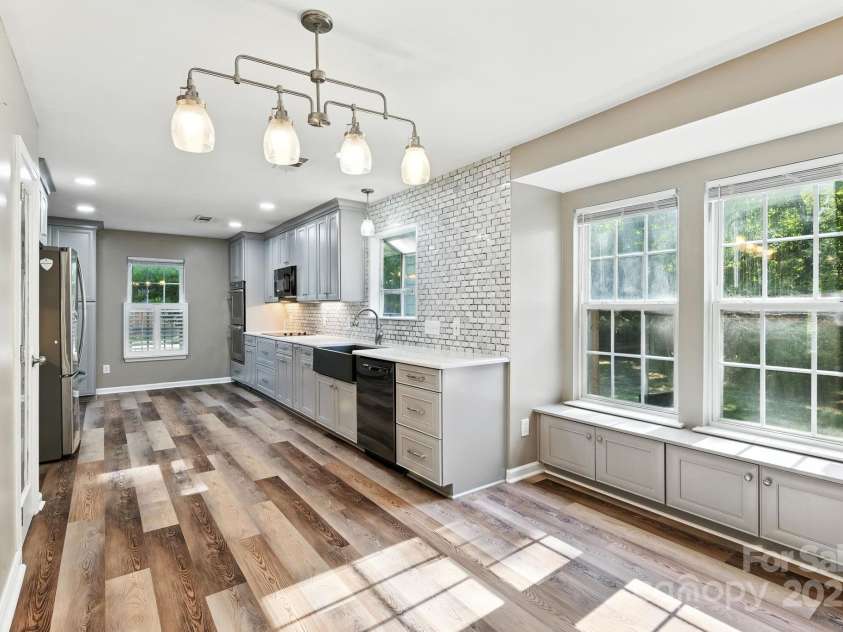 9003 Steelechase Drive, Charlotte, NC 28273.  MLS# CAR4288220, YatesRealty ID 31275. Dining Area with built-in storage