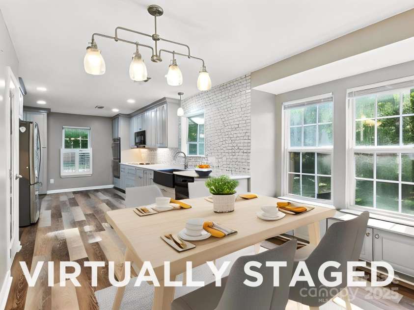 9003 Steelechase Drive, Charlotte, NC 28273.  MLS# CAR4288220, YatesRealty ID 31275. Kitchen / Dining Area - Virtually Staged