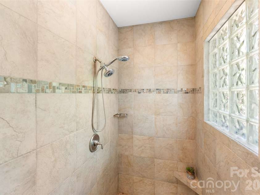 350 Winding Ridge Road, Black Mountain, NC 28711.  MLS# CAR4391914, YatesRealty ID 31277. Primary bath shower