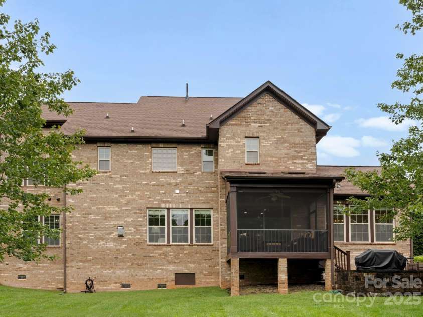 912 Oleander Lane, Waxhaw, NC 28173.  MLS# CAR4290027, YatesRealty ID 31279. Serene rear view overlooking a private pond