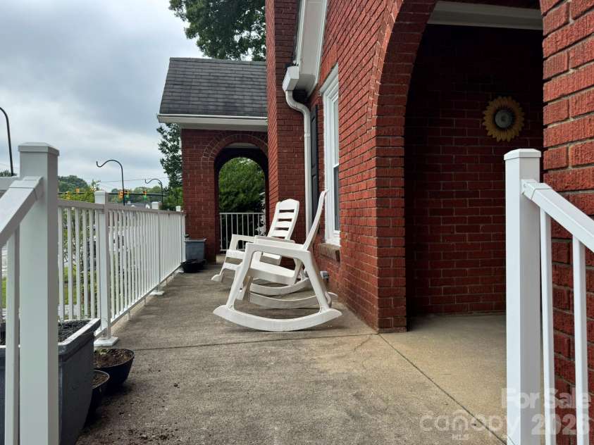 1303 Lane Street, Kannapolis, NC 28083.  MLS# CAR4390357, YatesRealty ID 31285. Front porch