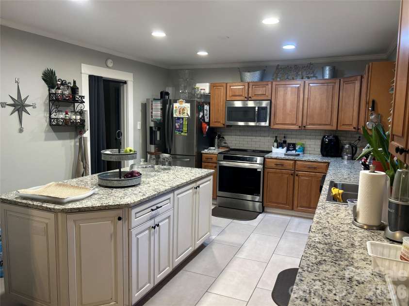 1303 Lane Street, Kannapolis, NC 28083.  MLS# CAR4390357, YatesRealty ID 31285. Kitchen