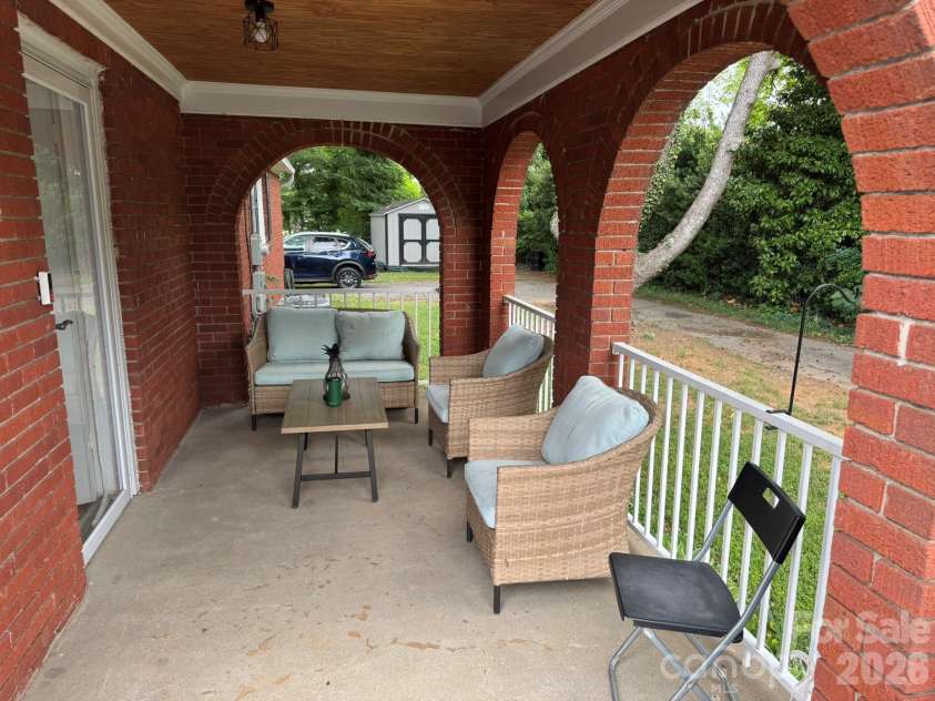 1303 Lane Street, Kannapolis, NC 28083.  MLS# CAR4390357, YatesRealty ID 31285. Side porch