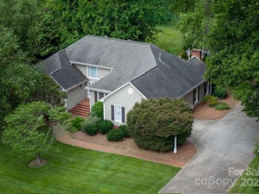 415 Greenbriar Road, Statesville, NC 28625.  MLS# CAR4288246, YatesRealty ID 31286. See the top of the back work building from this drone shot.