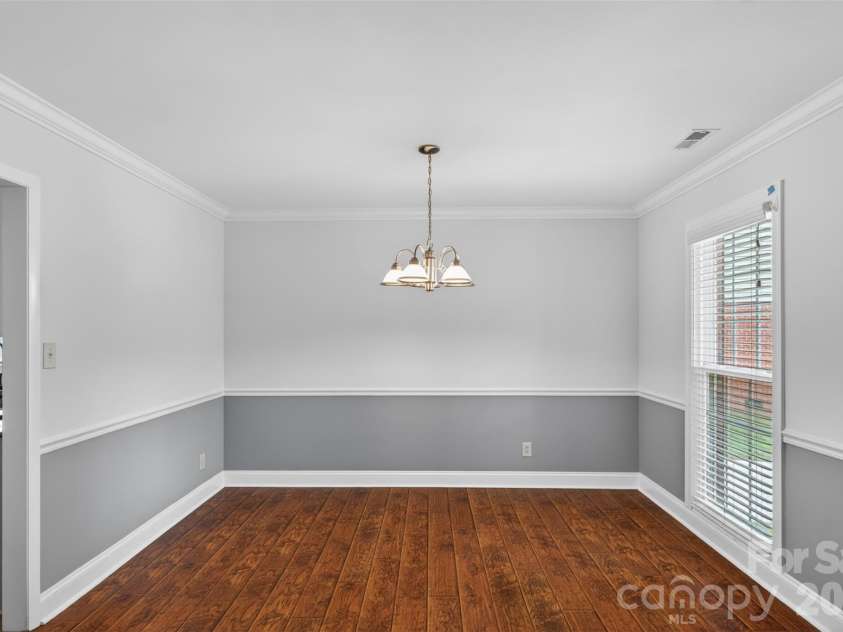 7148 Powder Mill Place, Charlotte, NC 28277.  MLS# CAR4379444, YatesRealty ID 31287. Dining room, directly off the kitchen