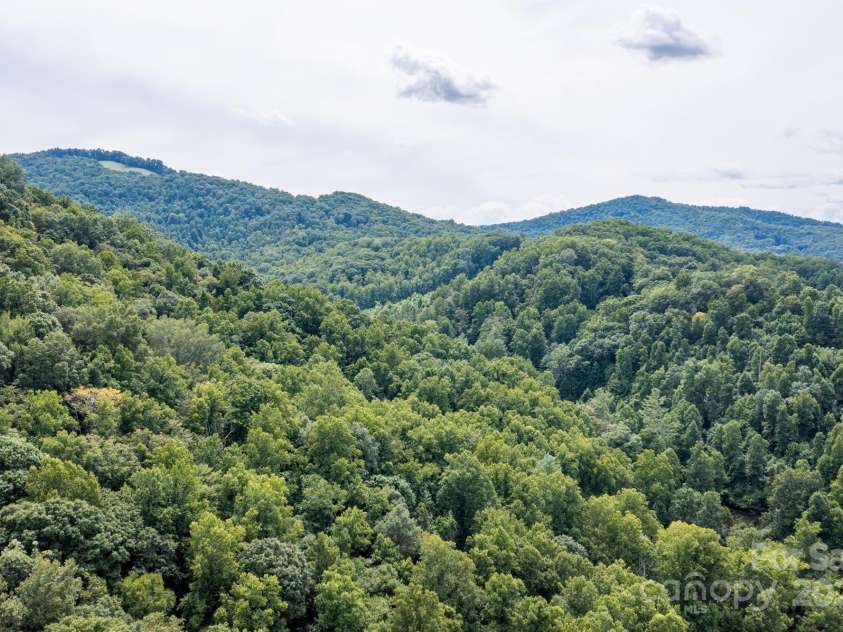 226 Wildcat Mountain Trail, Sylva, NC 28779.  MLS# CAR4284312, YatesRealty ID 31290. Surrounding mountains