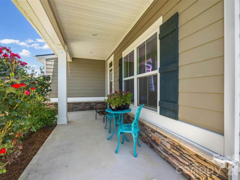 10295 October Glory Way, Charlotte, NC 28215.  MLS# CAR4389910, YatesRealty ID 31295. ENJOY COFFEE ON THE COVERED FRONT PORCH!