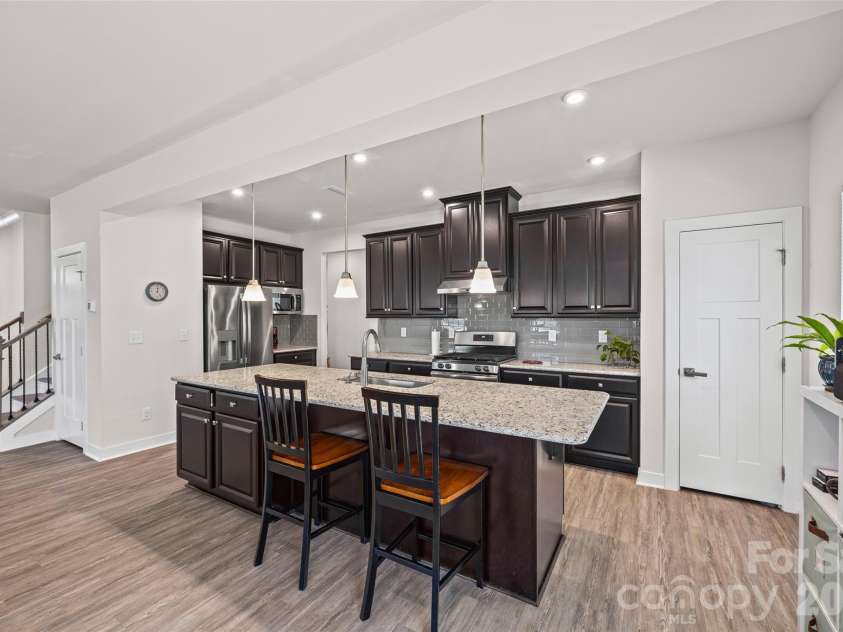 10295 October Glory Way, Charlotte, NC 28215.  MLS# CAR4389910, YatesRealty ID 31295. ISLAND WITH SEATING!