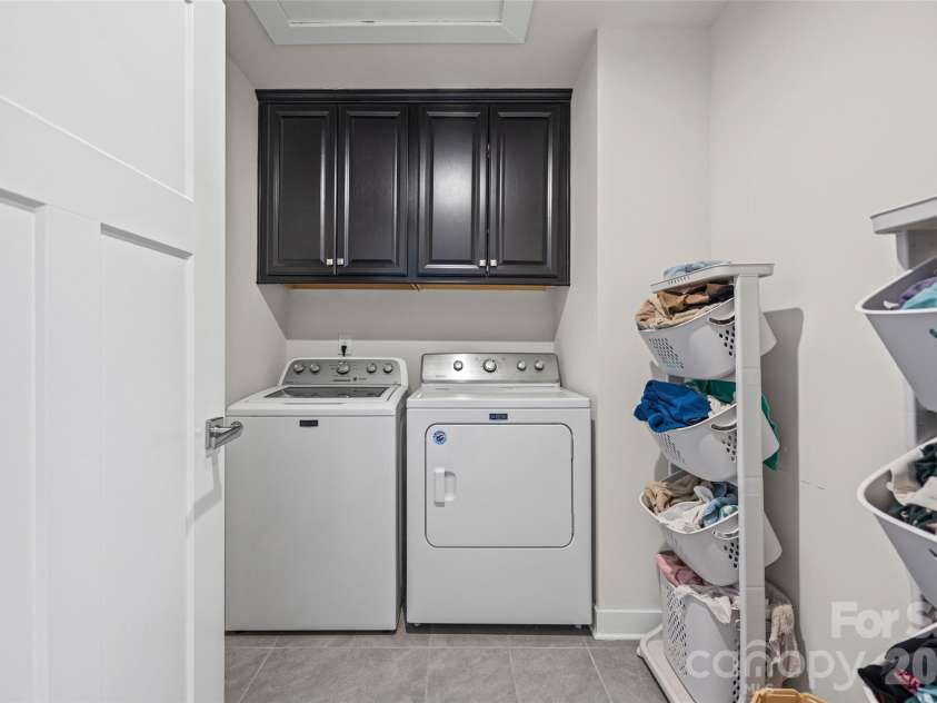 10295 October Glory Way, Charlotte, NC 28215.  MLS# CAR4389910, YatesRealty ID 31295. UPSAIRS LAUNDRY ROOM