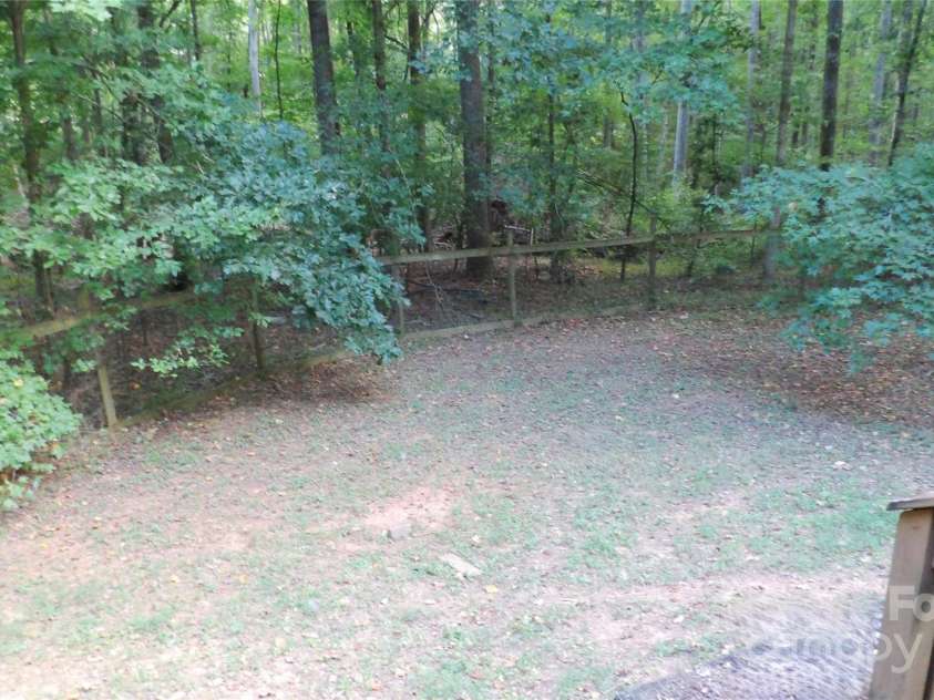 2705 Mountainview Road, Clover, SC 29710.  MLS# CAR4285670, YatesRealty ID 31297. Left Backyard