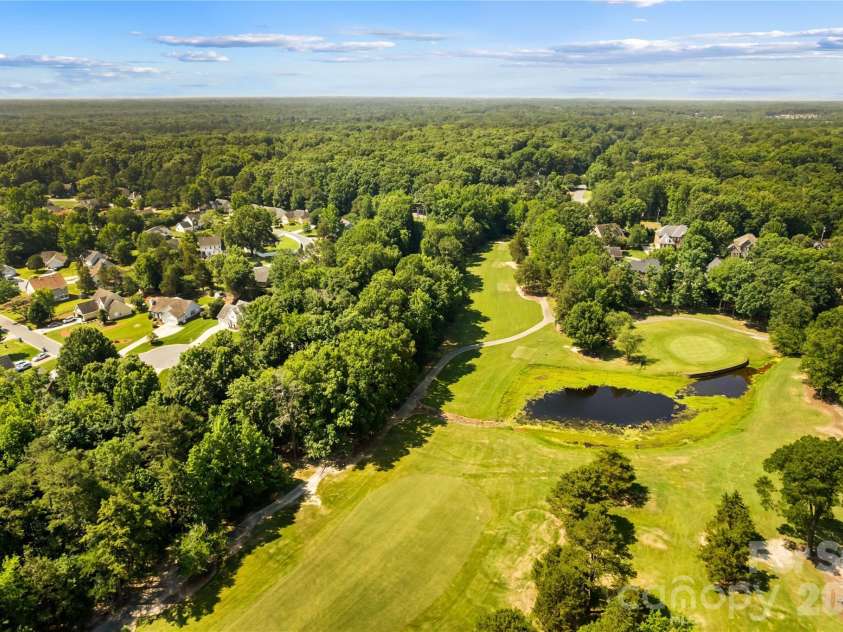 4425 Derbyshire Lane, Matthews, NC 28104.  MLS# CAR4393404, YatesRealty ID 31298. Golf Course is next door