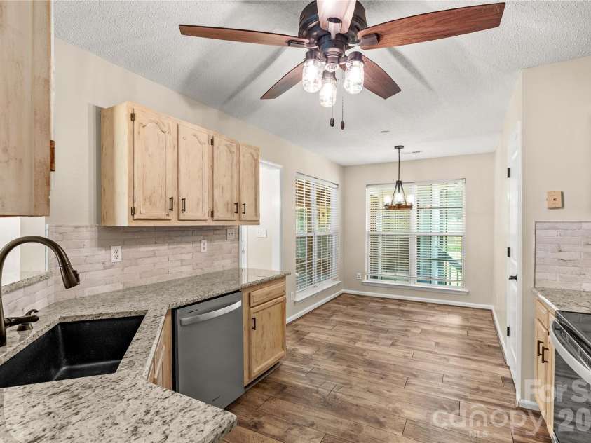 4425 Derbyshire Lane, Matthews, NC 28104.  MLS# CAR4393404, YatesRealty ID 31298. Open and Light Kitchen
