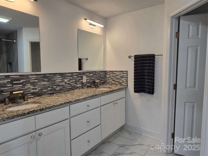 403 Stevens Street, China Grove, NC 28023.  MLS# CAR4281584, YatesRealty ID 31308. Hallway Bathroom