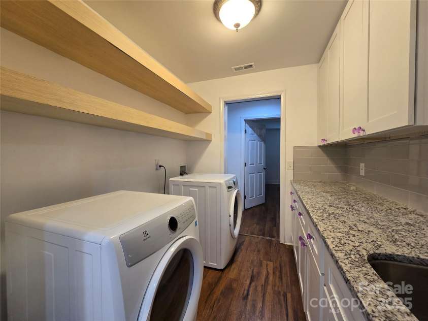 403 Stevens Street, China Grove, NC 28023.  MLS# CAR4281584, YatesRealty ID 31308. Laundry from kitchen side