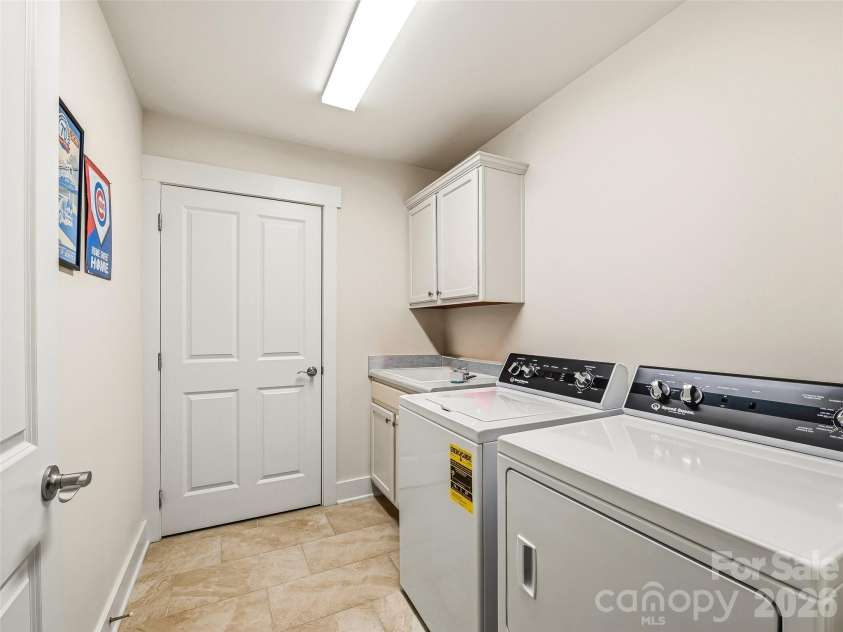 39 Braeburn Way, Flat Rock, NC 28731.  MLS# CAR4390391, YatesRealty ID 31313. Laundry and Storage