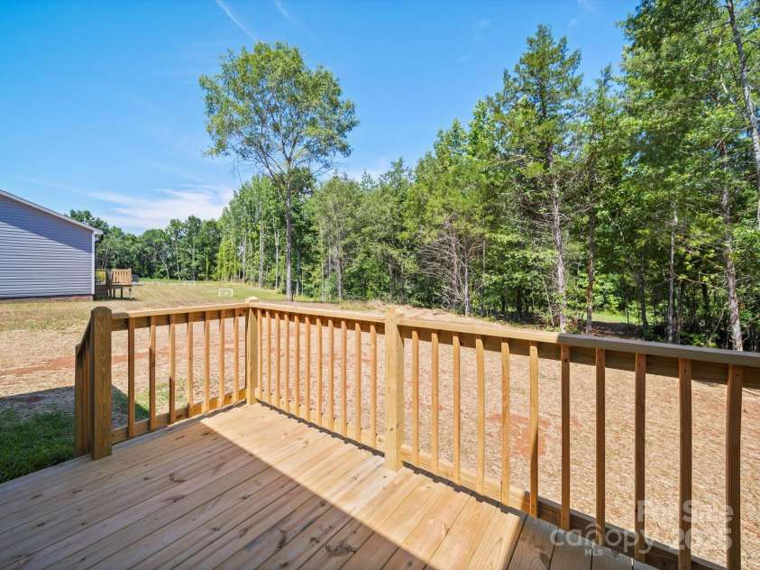 205 Hill Avenue, Albemarle, NC 28001.  MLS# CAR4278503, YatesRealty ID 31318. Back Deck
