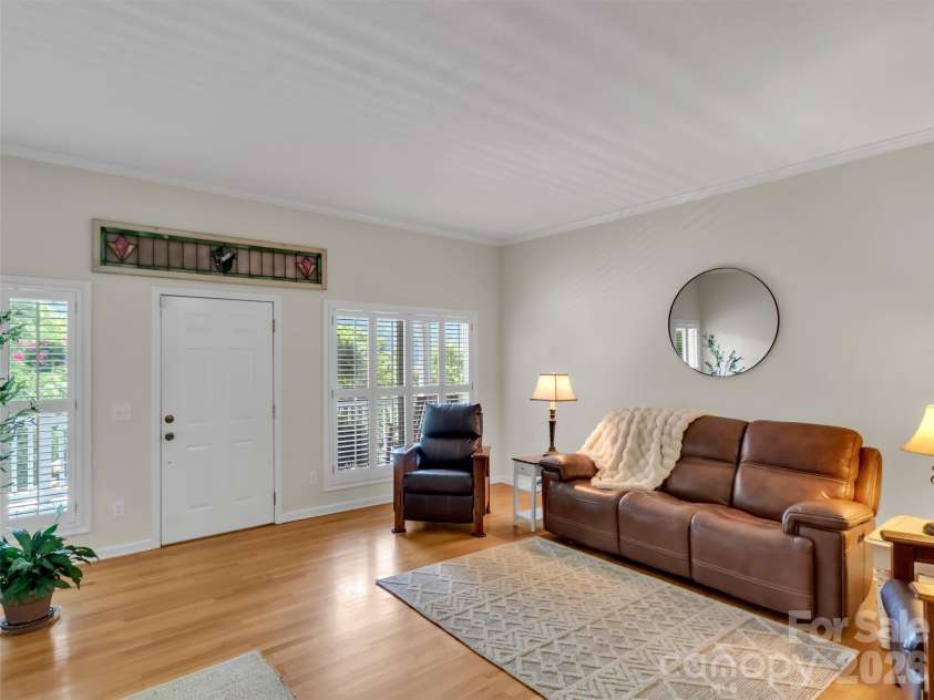 28 Mountain Breeze Drive, Maggie Valley, NC 28751.  MLS# CAR4271261, YatesRealty ID 3132. Great Room with 2 Sitting Areas