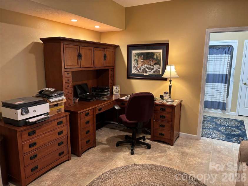 28 Mountain Breeze Drive, Maggie Valley, NC 28751.  MLS# CAR4271261, YatesRealty ID 3132. Lower Level Office