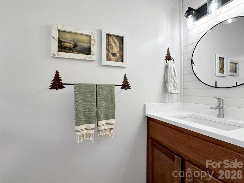 28 Mountain Breeze Drive, Maggie Valley, NC 28751.  MLS# CAR4271261, YatesRealty ID 3132. Powder Room with Quartz
