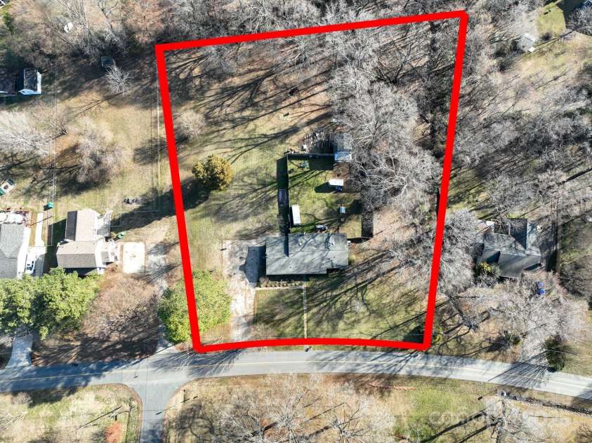624 Patricia Avenue, Harrisburg, NC 28075.  MLS# CAR4321459, YatesRealty ID 3132. Expansive large lot beyond fence line
