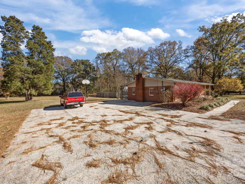 624 Patricia Avenue, Harrisburg, NC 28075.  MLS# CAR4321459, YatesRealty ID 3132. Large concrete drive