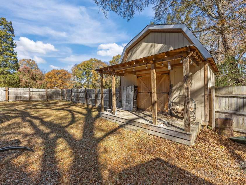 624 Patricia Avenue, Harrisburg, NC 28075.  MLS# CAR4321459, YatesRealty ID 3132. Multiple storage buildings 