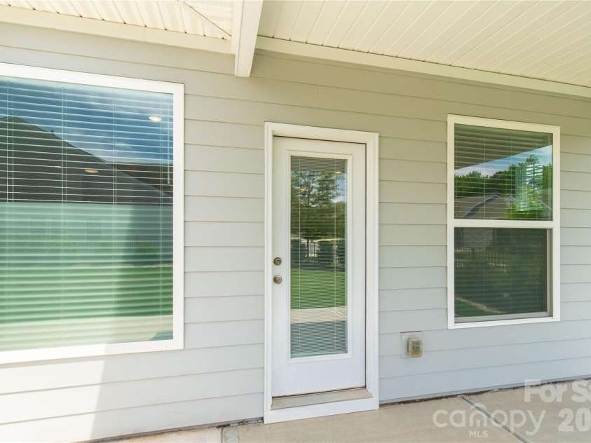 1025 Ansley Park Drive, Fort Mill, SC 29707.  MLS# CAR4387863, YatesRealty ID 31321. Covered patio