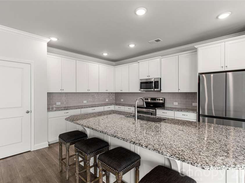 1025 Ansley Park Drive, Fort Mill, SC 29707.  MLS# CAR4387863, YatesRealty ID 31321. Large kitchen with pantry