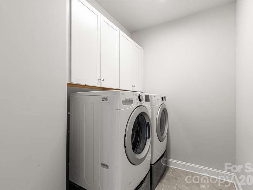 1025 Ansley Park Drive, Fort Mill, SC 29707.  MLS# CAR4387863, YatesRealty ID 31321. Large laundry room on main level