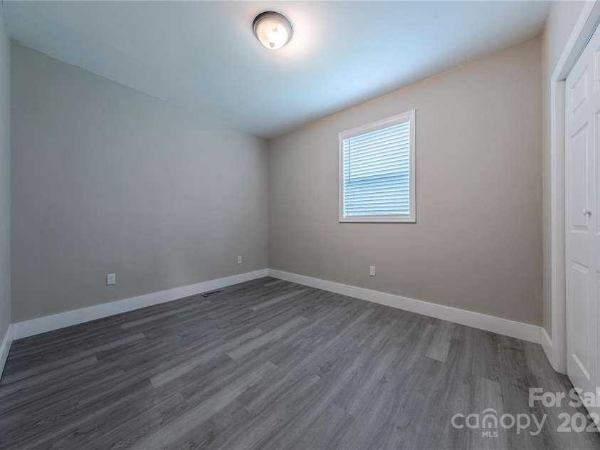 1334 Williams Estate Drive, Lancaster, SC 29720.  MLS# CAR4289609, YatesRealty ID 31322. 2nd bedroom with new lighting