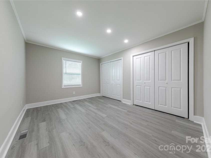 1334 Williams Estate Drive, Lancaster, SC 29720.  MLS# CAR4289609, YatesRealty ID 31322. 3rd bedroom with recessed lighting and 2 closet spaces