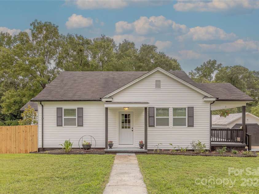 1334 Williams Estate Drive, Lancaster, SC 29720.  MLS# CAR4289609, YatesRealty ID 31322. Front with new vinyl siding and large storage shed