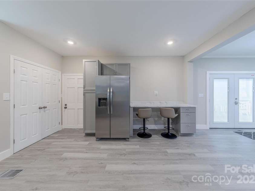 1334 Williams Estate Drive, Lancaster, SC 29720.  MLS# CAR4289609, YatesRealty ID 31322. View of kitchen from hallway with new recessed lighting