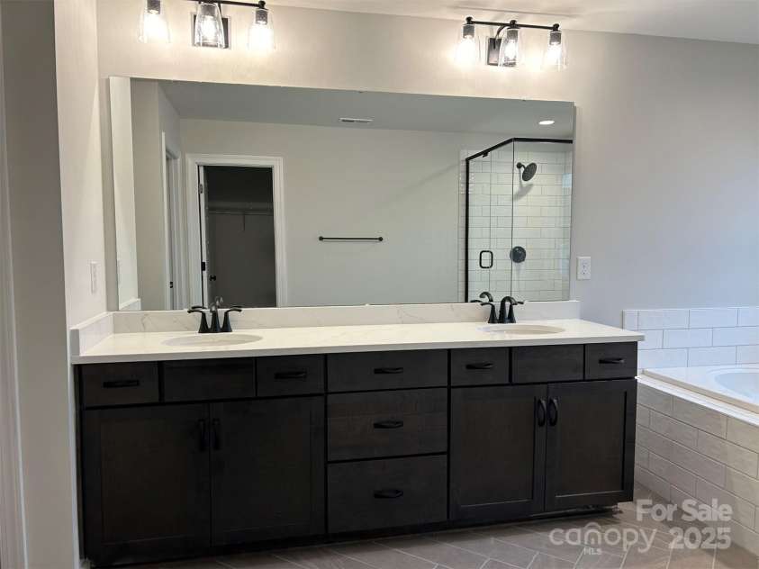 1714 Tabby Drive, Indian Trail, NC 28079.  MLS# CAR4243278, YatesRealty ID 31330. Premier Bath