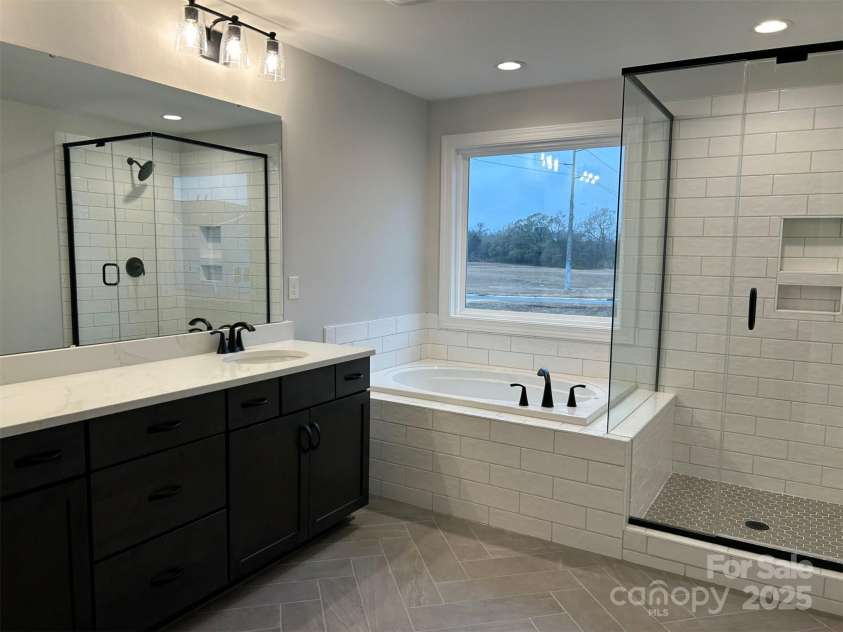 1714 Tabby Drive, Indian Trail, NC 28079.  MLS# CAR4243278, YatesRealty ID 31330. Premier Bath