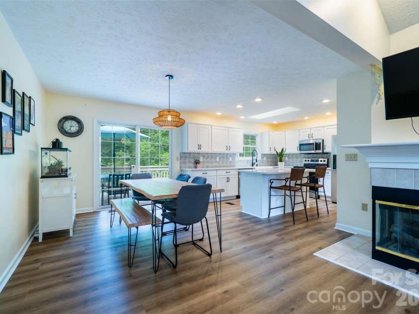 7 Firestone Court, Etowah, NC 28729.  MLS# CAR4383337, YatesRealty ID 31331. Dining opens into kitchen 