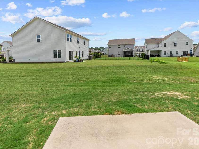 730 Autumn Sage Drive, Indian Trail, NC 28079.  MLS# CAR4390299, YatesRealty ID 31332. Corner Lot Back Yard