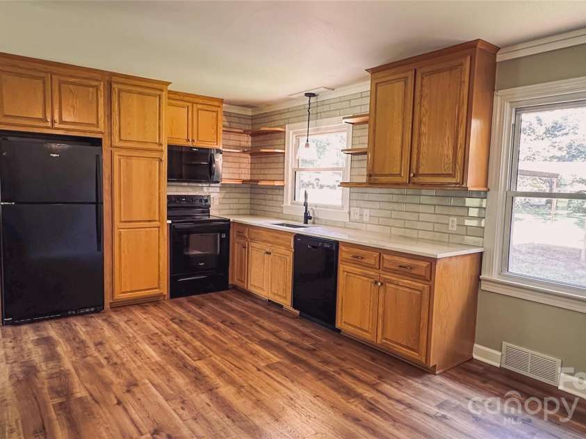 2680 Peachtree Road, Statesville, NC 28625.  MLS# CAR4290683, YatesRealty ID 31333. Fully renovated kitchen with brand new countertops and appliances, ready for everyday cooking or entertaining.