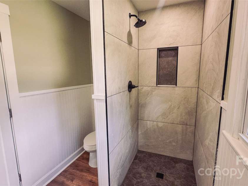 2680 Peachtree Road, Statesville, NC 28625.  MLS# CAR4290683, YatesRealty ID 31333. Stylish new bathroom with updated fixtures and modern finishes.