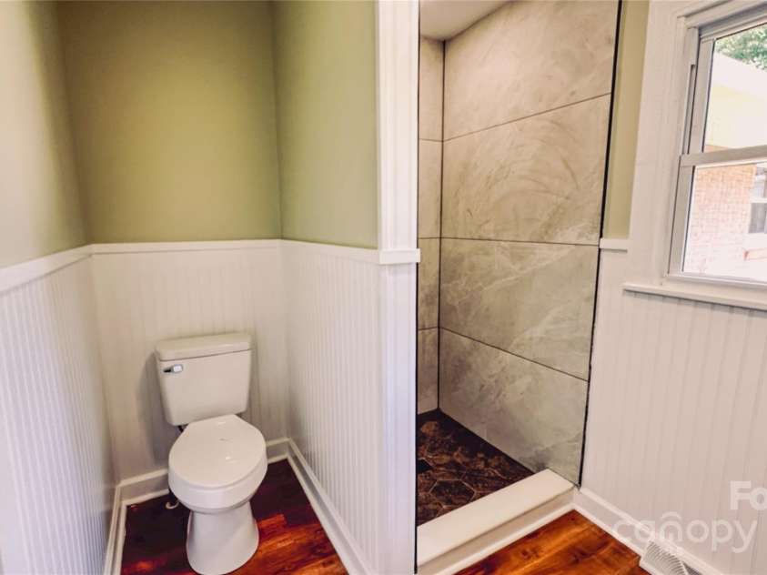2680 Peachtree Road, Statesville, NC 28625.  MLS# CAR4290683, YatesRealty ID 31333. Stylish new bathroom with updated fixtures and modern finishes.